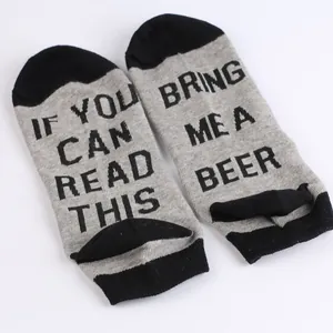 Detail view of cotton ankle socks with 'Bring Me A Beer' funny text print