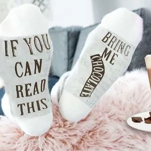 Funny white cotton crew socks with IF YOU CAN READ THIS BRING ME CHOCOLATE printed text