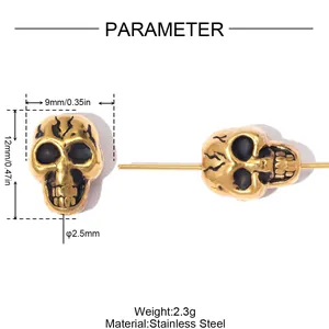 Vista dettagliata della perla teschio in acciaio dorato con misure