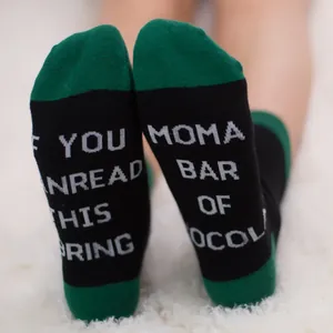 Funny black and green knitted cotton mid-calf socks with 'Bring Moma Chocolate' text