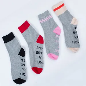 Set of four unisex grey cotton mid-calf socks featuring funny English letter prints on soles