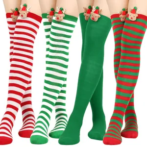 Detailed view of festive Christmas over-the-knee stockings with reindeer plush decor and stripes