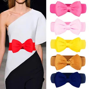 Detailed view showing multiple vibrant colors of elastic bow tie belts for women's dresses
