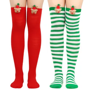 Festive Christmas over-the-knee socks with reindeer ornaments and striped patterns.