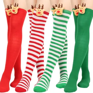 Detailed view of four pairs of festive Christmas over-the-knee socks with reindeer dolls