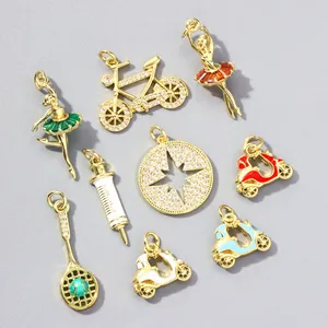 Variety of gold-plated copper zircon charms featuring ballet dancers, bicycle, and scooters.