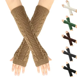 Long knitted fingerless arm warmers for women in various colors showing cable knit texture