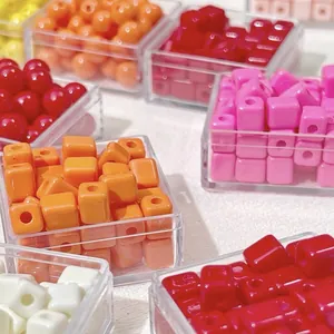 Macro view of colorful macaron acrylic square beads for DIY jewelry making projects
