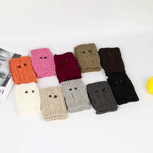 Display of colorful knitted owl leg warmers in multiple shades for winter boot cuffs