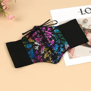 Detail view of a black corset belt with vibrant neon butterfly prints and lace-up front.