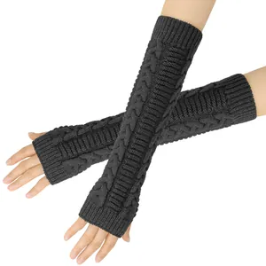 Close-up detail of charcoal grey cable knit long fingerless gloves showing soft texture