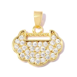 Detail view of 18K gold plated safe lock pendant with sparkling cubic zirconia stones