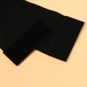 Detailed macro shot showing texture and Velcro fastening of black elastic corset belt