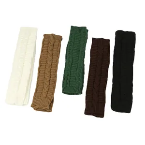 Detailed view of cable knit fingerless arm warmers in five colors for autumn winter