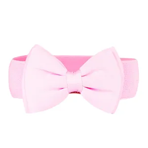 Close-up detail of a large pink chiffon bow on a wide elastic waist belt accessory