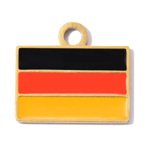 Detailed macro view of Germany flag enamel pendant in high polished gold-tone metal