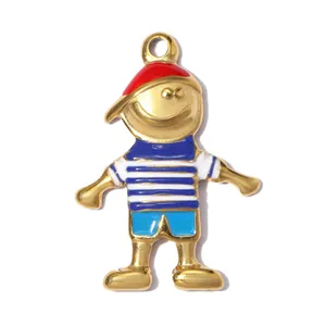 Macro detail of a colorful enamel cartoon boy pendant made of durable stainless steel