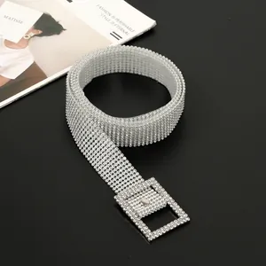 Close-up of elegant women's full rhinestone sparkly belt featuring a large square buckle