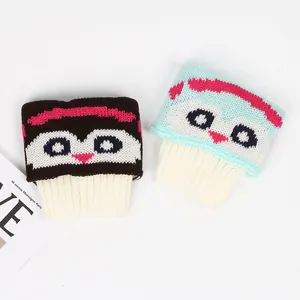 Jambières tricotées avec motif jacquard hibou et poignets côtelés en marron et bleu.