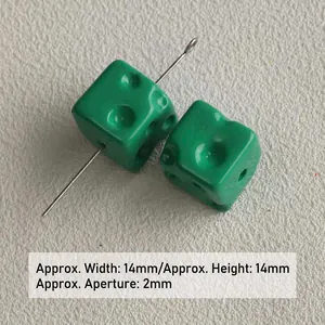 Close-up of green acrylic cheese cube beads showing 14mm size and 2mm hole