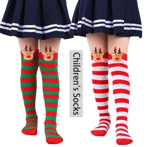 Festive striped children's Christmas over-the-knee socks with cute plush reindeer motifs