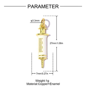 Detailed size parameter chart for a creative syringe charm in gold and white enamel