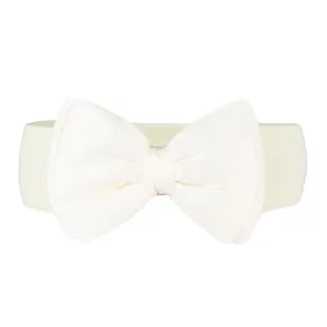 Detail shot of elegant white elastic waist belt featuring a large chiffon bow decoration