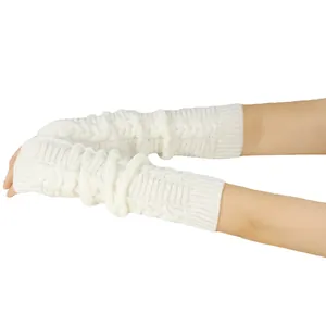 Close-up view of elegant off-white cable-knit long fingerless arm warmers for women