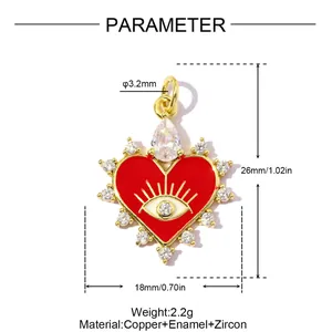 Detail view of red heart evil eye pendant with 18k gold plating and zircon accents