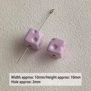 Macro view of lavender acrylic cheese cube beads for DIY crafts, 10mm with 2mm hole