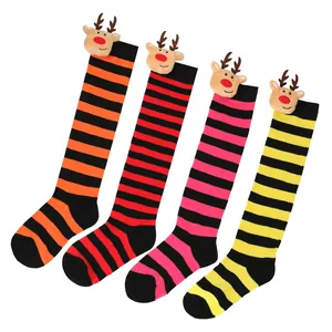 Variety of colorful striped Christmas long socks with cute 3D reindeer plush toy