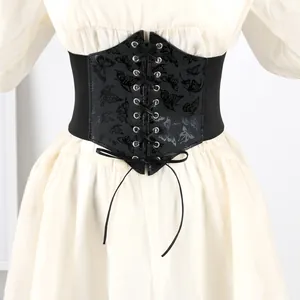Detail view of black printed butterfly corset belt with elegant lace-up front and elastic band