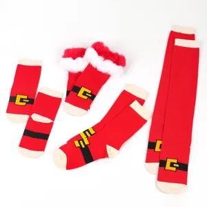 Collection of various length Christmas socks with Santa belt design and furry trim.