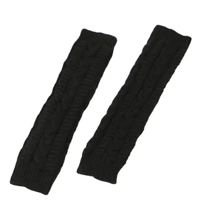 Detailed view of black cable-knit long fingerless arm warmers for winter