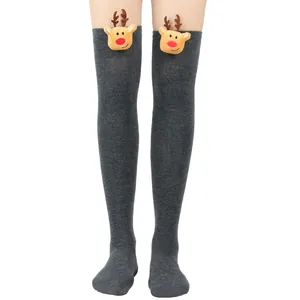 Detail view of 3D reindeer plush decoration on dark grey Christmas over-the-knee socks