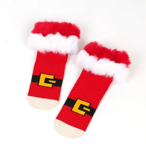 Festive Santa-themed Christmas socks with soft red faux fur trim and belt buckle pattern