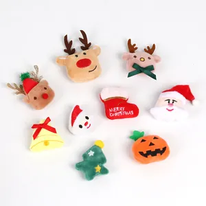 Collection of cute Christmas plush doll accessories featuring reindeer, Santa, and a tree