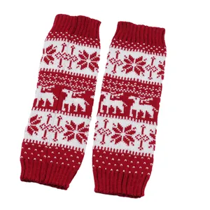 Festive red and white knitted leg warmers featuring snowflake and reindeer patterns