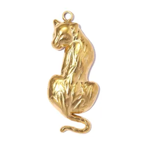 A detailed view of a sculptural gold panther pendant crafted from polished stainless steel.