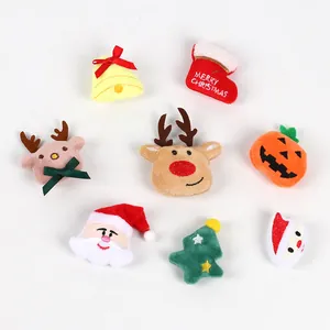 Detailed view of cute plush Christmas and Halloween character patches for children's socks
