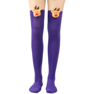 Detailed view of cute plush reindeer heads on purple Christmas over-the-knee socks