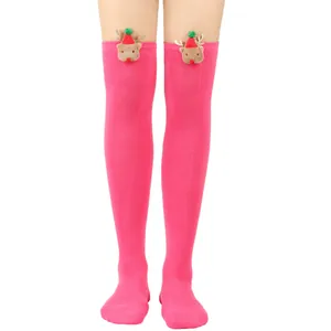 Close-up of pink over-the-knee socks featuring cute 3D plush reindeer cuffs for Christmas