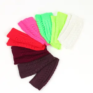 Detailed macro view of colorful cable knit fingerless gloves in a vibrant fan arrangement