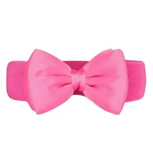 Close-up of bright pink elastic waist belt featuring a large decorative satin bow