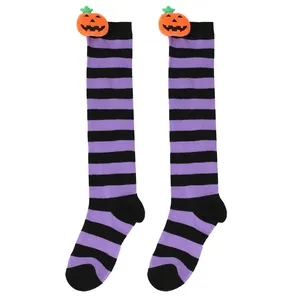 Cute Halloween striped knee-high socks for kids featuring 3D plush pumpkin dolls