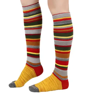 Close-up of colorful horizontal striped knee-high cotton socks for women