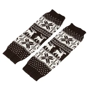 Detailed view of knitted Christmas leg warmers featuring reindeer and snowflake patterns