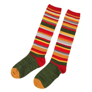 Detailed view of colorful striped knee-high cotton socks with vintage Harajuku style.
