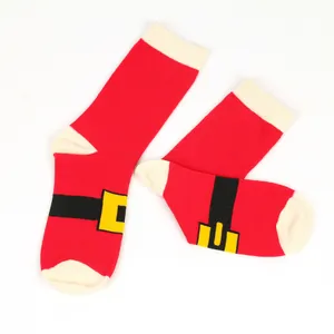 Detailed view of warm Christmas socks with Santa suit belt and buckle pattern design