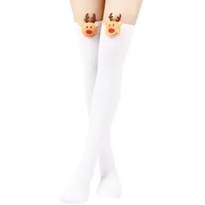 Detailed view of white over-the-knee socks with cute 3D plush reindeer decoration